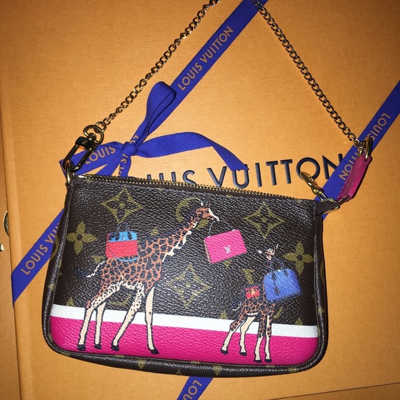 Louis Vuitton Handbags - 🔥SALE🔥LV Ltd. Ed. 2017 “Giraffes” mini-pochette